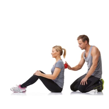 Massage ball, physiotherapy and studio with a woman with sport, fitness and workout back injury. Physical therapy, man and wellness with physio health and helping with white background and support