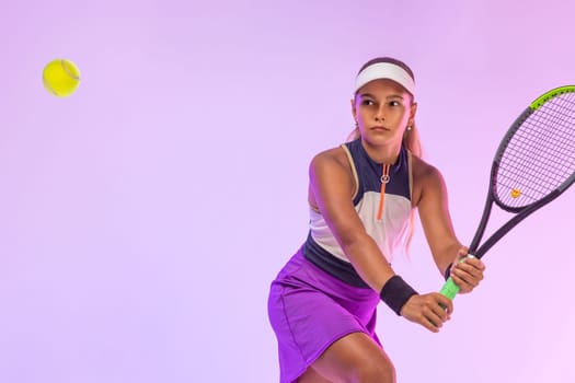 Tennis player teen. Teenager athlete isolated on pink background. Fitness and sport concept.