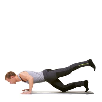 Man, pilates and mat in studio for stretching legs, fitness or workout for healthy body, wellness or core muscle. Person, exercise and yoga on floor for abdomen on mockup space or white background.