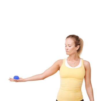 Stress ball, health and woman in studio for mindful, fitness and arm exercise with focus. Squeeze, sport equipment and young female person from Canada with anxiety relief isolated by white background.