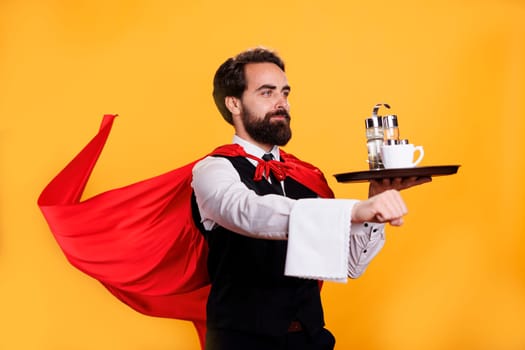 Superhuman butler with cape and platter