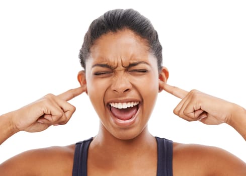 Face, shouting and fingers in ears with a woman in studio isolated on a white background to block sound. Frustrated, screaming and eyes closed with an angry young person closeup to stop loud noise