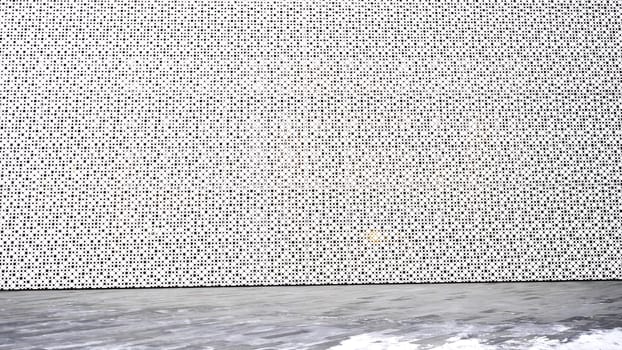 Abstract architectural pattern. Futuristic wall. Architectural wall made in futuristic style in outdoor