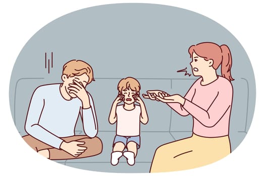 Unhappy child crying with parents fighting