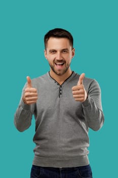 portrait of happy bearded man showing thumbs up