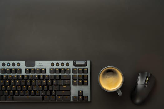 Computer keyboard and mouse on black background