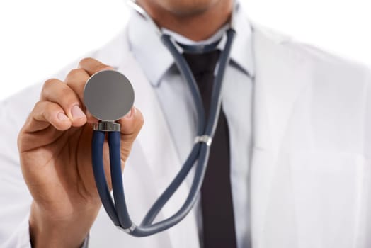 Doctor, hands or stethoscope in studio for heartbeat, healthcare services or cardiology on white background. Closeup, medical worker or tools for listening to lungs, cardiovascular test or evaluation
