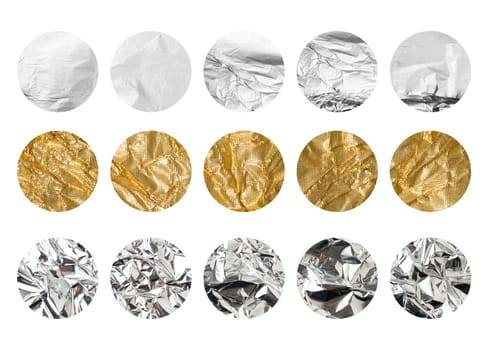 Round stickers of gray and yellow crumpled foil isolated on background