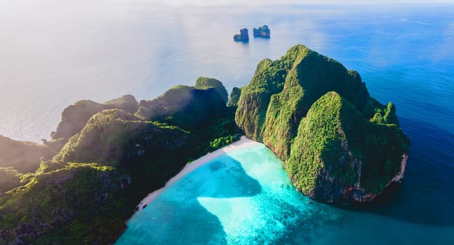 Drone view at Maya Bay Koh Phi Phi Thailand, Turquoise clear water white tropical beach