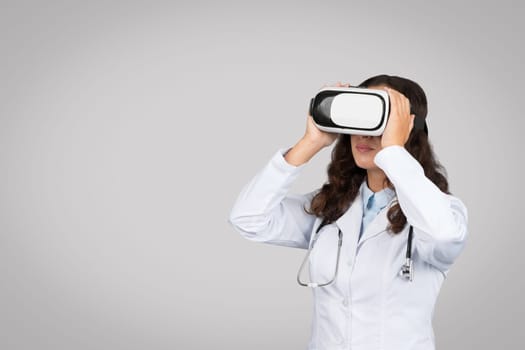 Doctor woman exploring with virtual reality headset