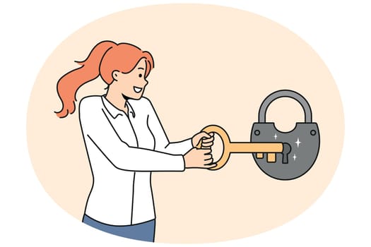 Smiling woman open lock with huge key