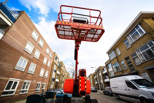 Aerial work platform, Elevating picker at europaen city street for urban infrastructure renovation