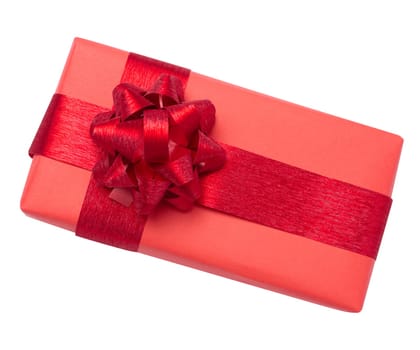 Box is wrapped in red gift wrapping paper and red ribbon