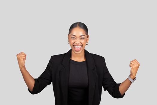 Exuberant African American businesswoman with a joyous expression