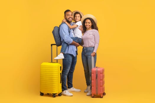 Family Trip Concept. Happy African American Parents Travelling With Their Little Son