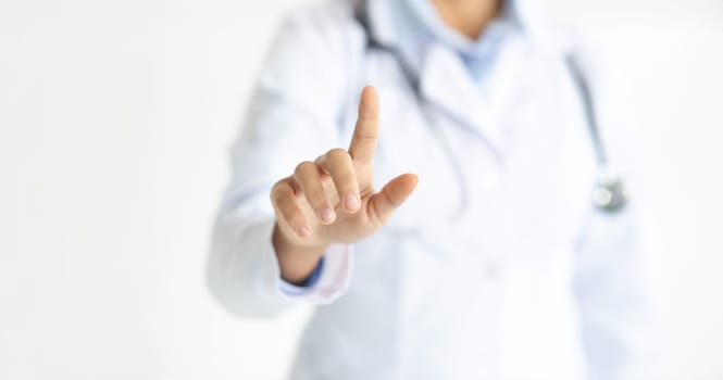 Unrecognizable woman doctor touching transparent screen, cropped