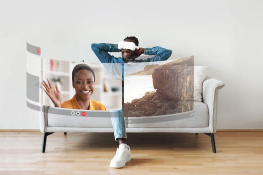 Young African American couple having virtual reality video call Indoor