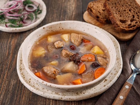 Clear soup with pork and vegetables