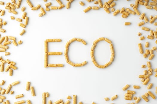 Wood pellets formed in word 'ECO' isolated on white background