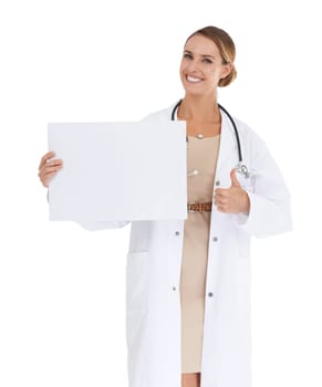 Doctor, thumbs up and poster mockup in studio for medical information, services and presentation. Portrait of healthcare woman with like, yes and feedback with paper and space on a white background