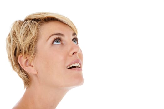 Woman, face and looking up on mockup space for news, notification or alert on a white studio background. Closeup of young female person, model or blonde smile in wonder, thinking or sight for vision