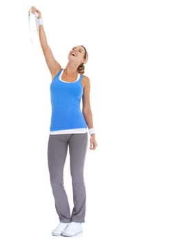 Health, measuring tape and portrait of woman in a studio for exercise, training or workout. Sports, smile and young happy female person with equipment for weight loss isolated by white background.