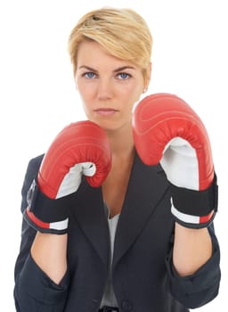 Businesswoman, portrait and boxing gloves with face for corporate fight, confident and white background. Executive, strong and dedicated professional to business, formal and serious female person