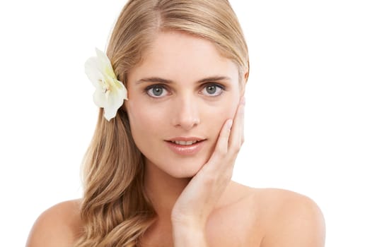 Woman, portrait and beauty in studio with flower, makeup and pride for cosmetic glow on mock up. Model, person or sustainable dermatology for haircare or natural organic skincare on white background