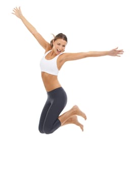 Woman, jumping and fitness in studio for exercise or wellness health or performance, mockup or white background. Female person, excited and leap or gym workout pride for balance, yoga or flexibility