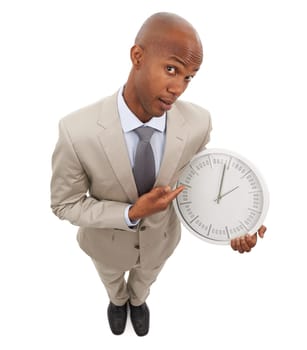Businessman, portrait and face clock for corporate professional lawyer for deadline, hurry or time management. Black person, point and white background in studio for company efficient, hour or mockup