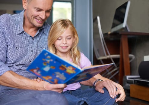 Father, child and reading book at homeschool, learning and fantasy fiction for education at home. Daddy, daughter and bonding together in childhood, literacy and storytelling for language development