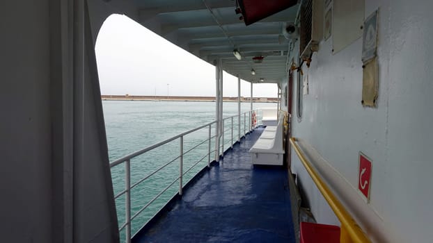 The side deck of a ferry towards the Mediterranean islands.