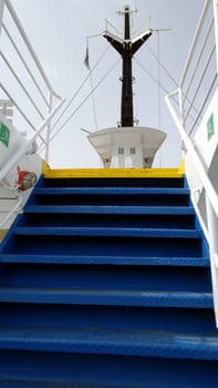 The stairs of a ferry towards the Mediterranean islands.