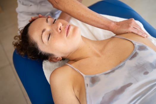 Relaxed woman getting physiotherapy treatment