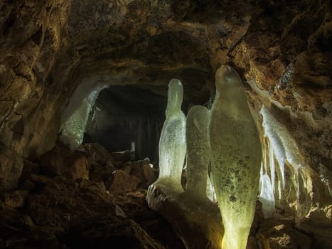 ice stalactites and stalagmites in the cave. Perm, Russia