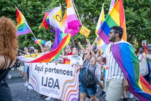 Lisbon, Portugal. 17 June 2023: LGBTQ activists with banners at Pride Parade