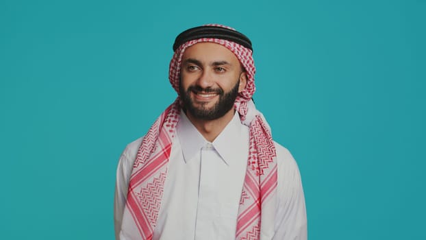 Muslim adult smiling with confidence