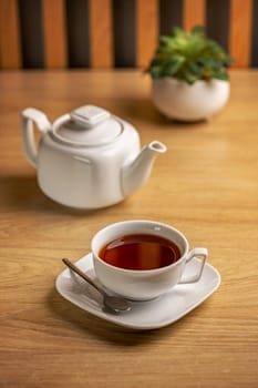 White tea kettle and white cup 