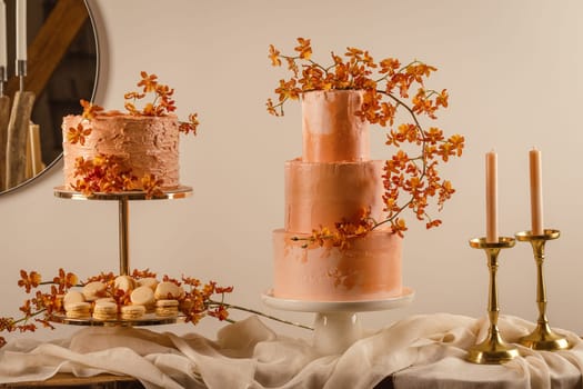Tall peach colored wedding cake