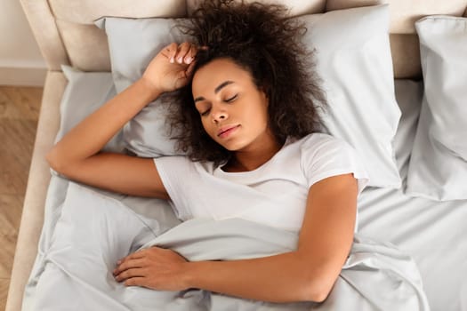 Top View Of African American Millennial Lady Sleeping Enjoying Rest