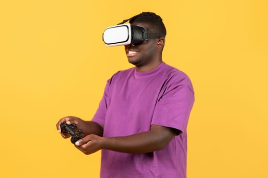 African american guy experiencing virtual reality wearing VR headset, studio