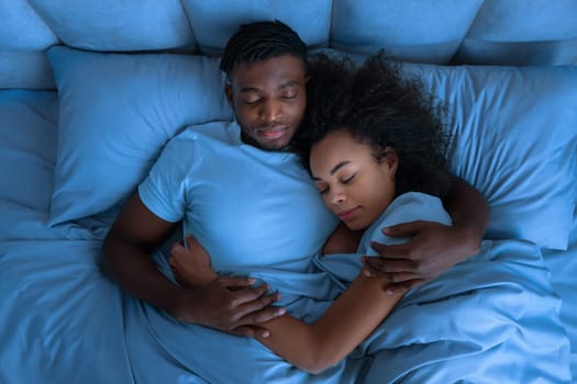 Above View Of Young Black Spouses Peacefully Napping And Hugging