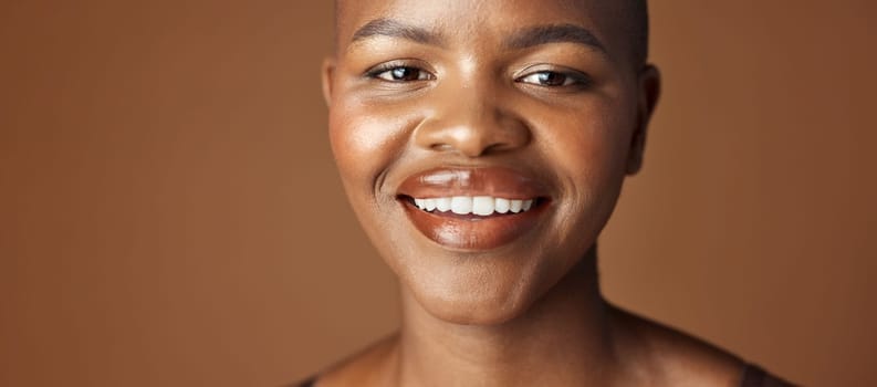 Face, skincare and smile with happy black woman in studio isolated on brown background for wellness. Portrait, beauty and aesthetic for foundation cosmetics or dermatology with a natural young person.
