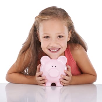 Piggy bank, savings and girl kid in portrait, finance and learn money management on white background. Budget, growth and investment with young person and financial security, future and cash in studio