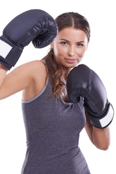 Sports, boxing gloves and portrait of woman boxer in studio for exercise or arm muscle training. Fitness, health and young female athlete with equipment for intense cardio workout by white background