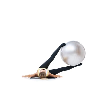 Exercise ball, mockup and fitness woman on a studio floor for legs, strength or training challenge on white background. Gym, space and lady athlete with inflatable for ground, workout or flexibility