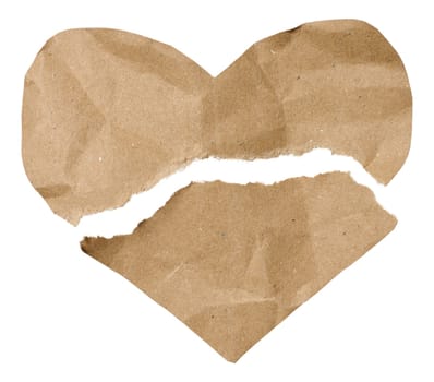 Torn paper heart cut from brown kraft paper on isolated background