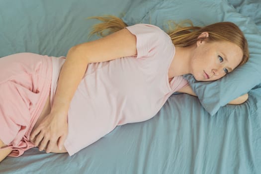 Sleep-deprived pregnant woman struggles with insomnia, navigating the challenges of restlessness during pregnancy