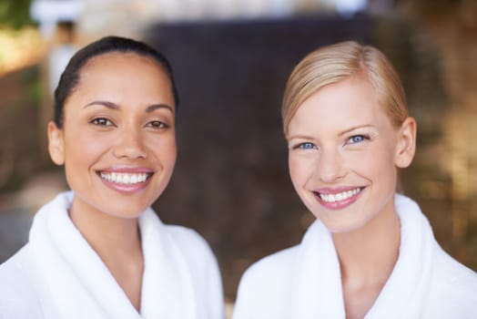 Portrait, smile and friends at spa for beauty, therapy and skincare treatment for wellness. Face, happy women and salon to relax, luxury pamper and diverse girls together at outdoor resort for health