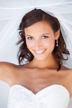 Wedding, veil and portrait of bride with makeup and fashion for celebration of marriage. Bridal, aesthetic and happy woman at commitment ceremony with beauty, cosmetics and confidence in dress